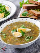 Green sorrel soup with eggs. Summer menu. Healthy food.